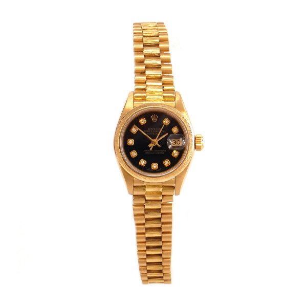 18kt gold Rolex Oyster Perpetual Datejust ref. nr 69178. D: 26mm. With box and papers. Sold 23/12 1985